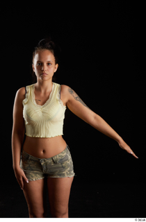 Jennifer Mendez 1 arm casual dressed flexing front view tank…